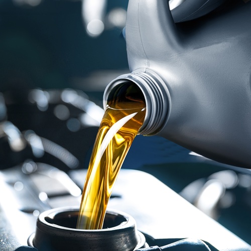 Pouring,Motor,Oil,From,Silver,Plastic,Canister.,Regular,And,Routine